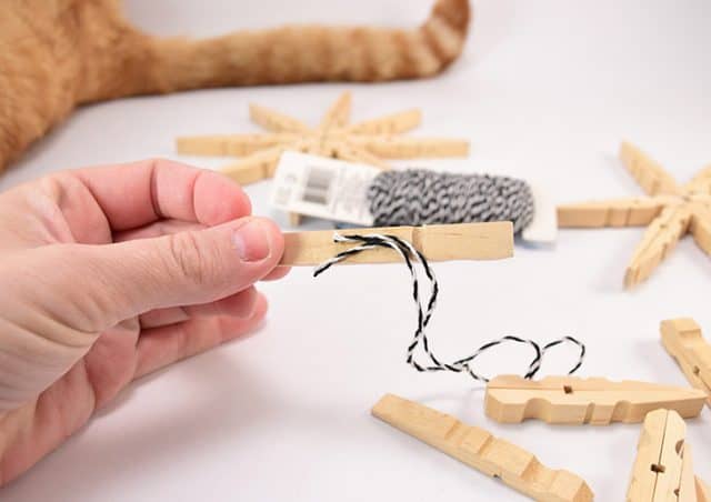 DIY Glitter Clothespin Snowflakes Craft